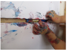 Symbolfoto Fingerfarbenmahlen